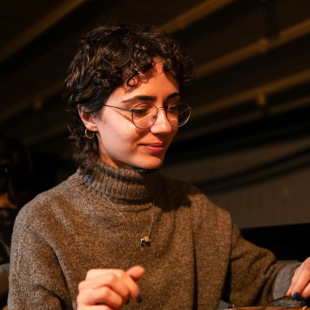 Studio portrait of a professional woman with glasses